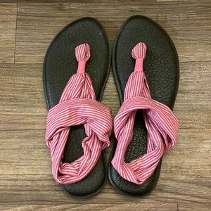 Black, gray and pink size 6 Sanuk Sandals. Never worn